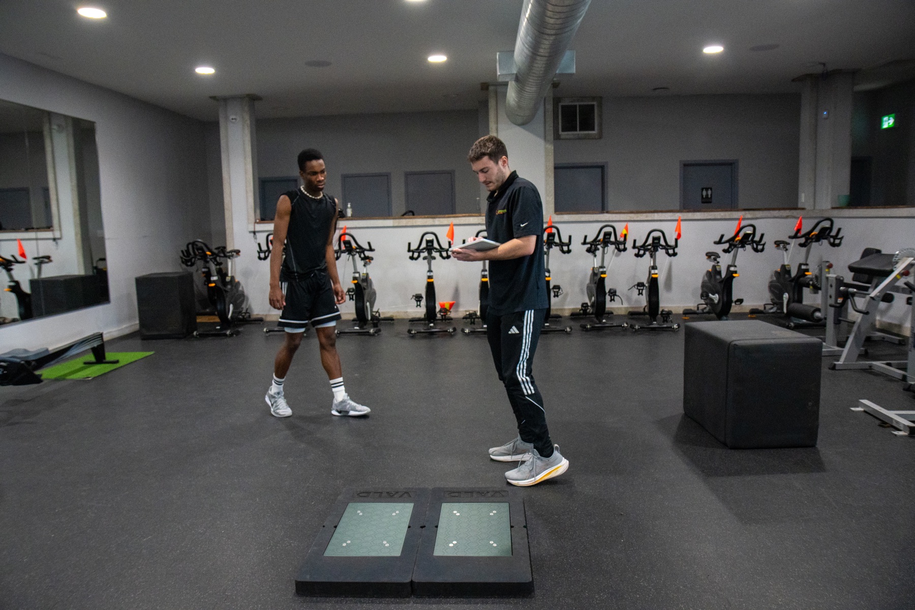 Michael DiMaurizio reviewing performance testing with an athlete at Generations